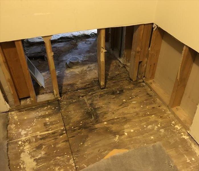 Water damage to the floor.